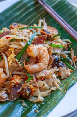  Char Kway Teow! Een Romig en Kruidig Chinees-Maleisische Noodlewonder